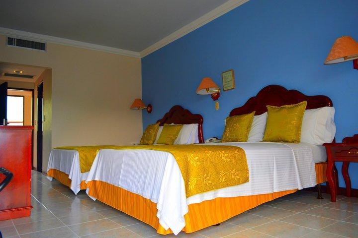 Casa Morales Hotel Internacional Y Centro De Convenciones Ibagué Dış mekan fotoğraf A room at the hotel