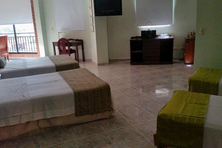 Casa Morales Hotel Internacional Y Centro De Convenciones Ibagué Dış mekan fotoğraf A room at the hotel