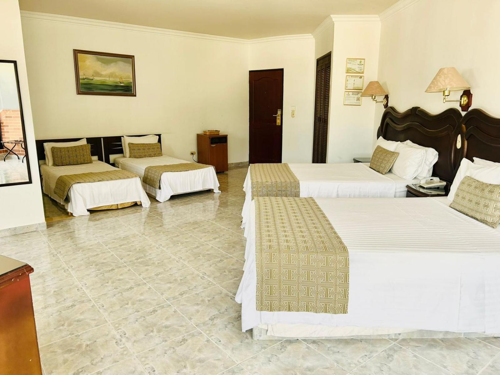 Casa Morales Hotel Internacional Y Centro De Convenciones Ibagué Dış mekan fotoğraf A room at the hotel