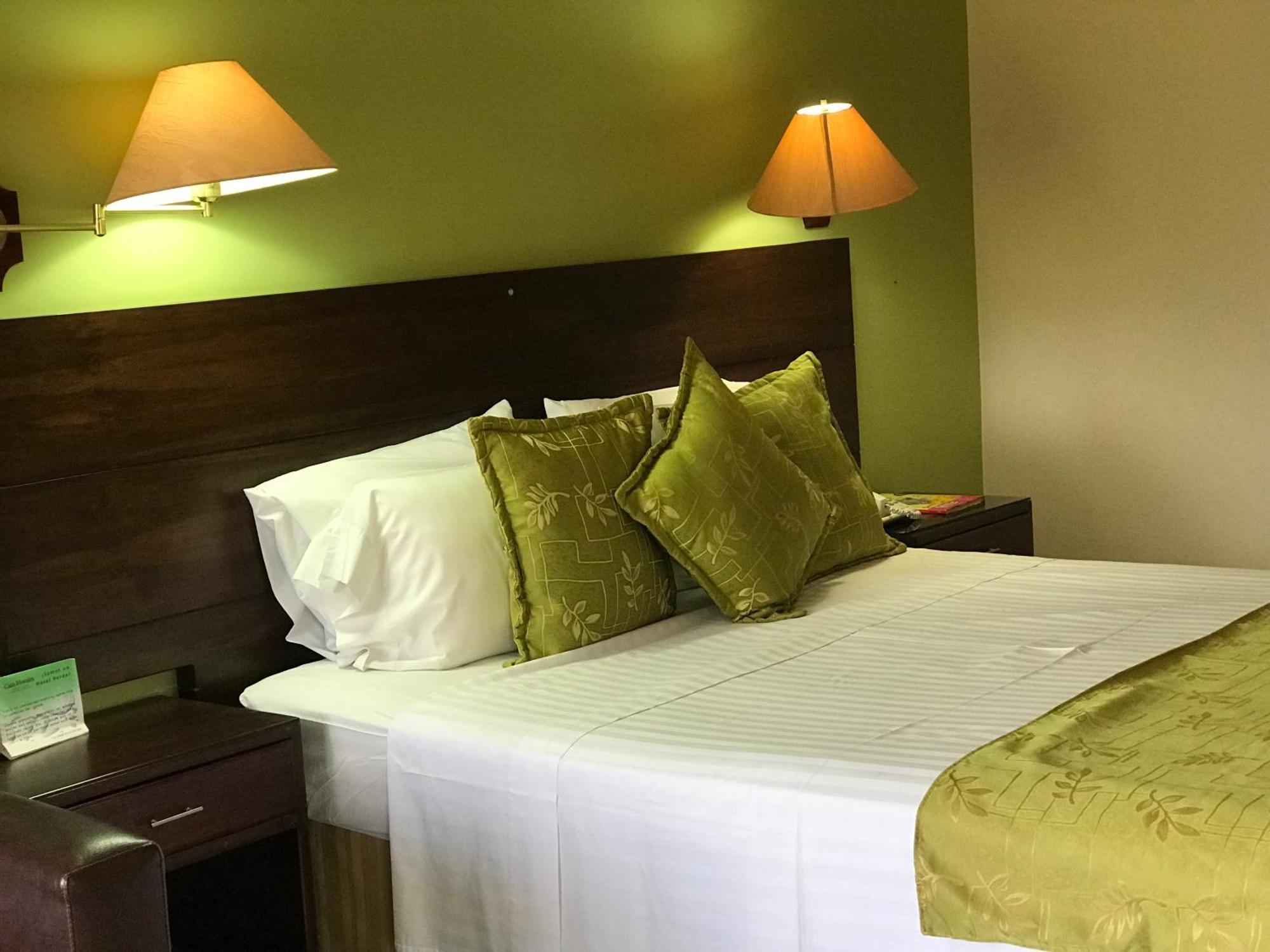 Casa Morales Hotel Internacional Y Centro De Convenciones Ibagué Dış mekan fotoğraf A bedroom at the hotel