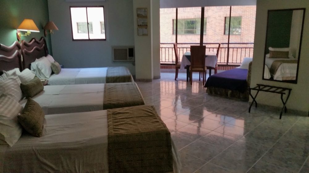 Casa Morales Hotel Internacional Y Centro De Convenciones Ibagué Dış mekan fotoğraf A room at the hotel